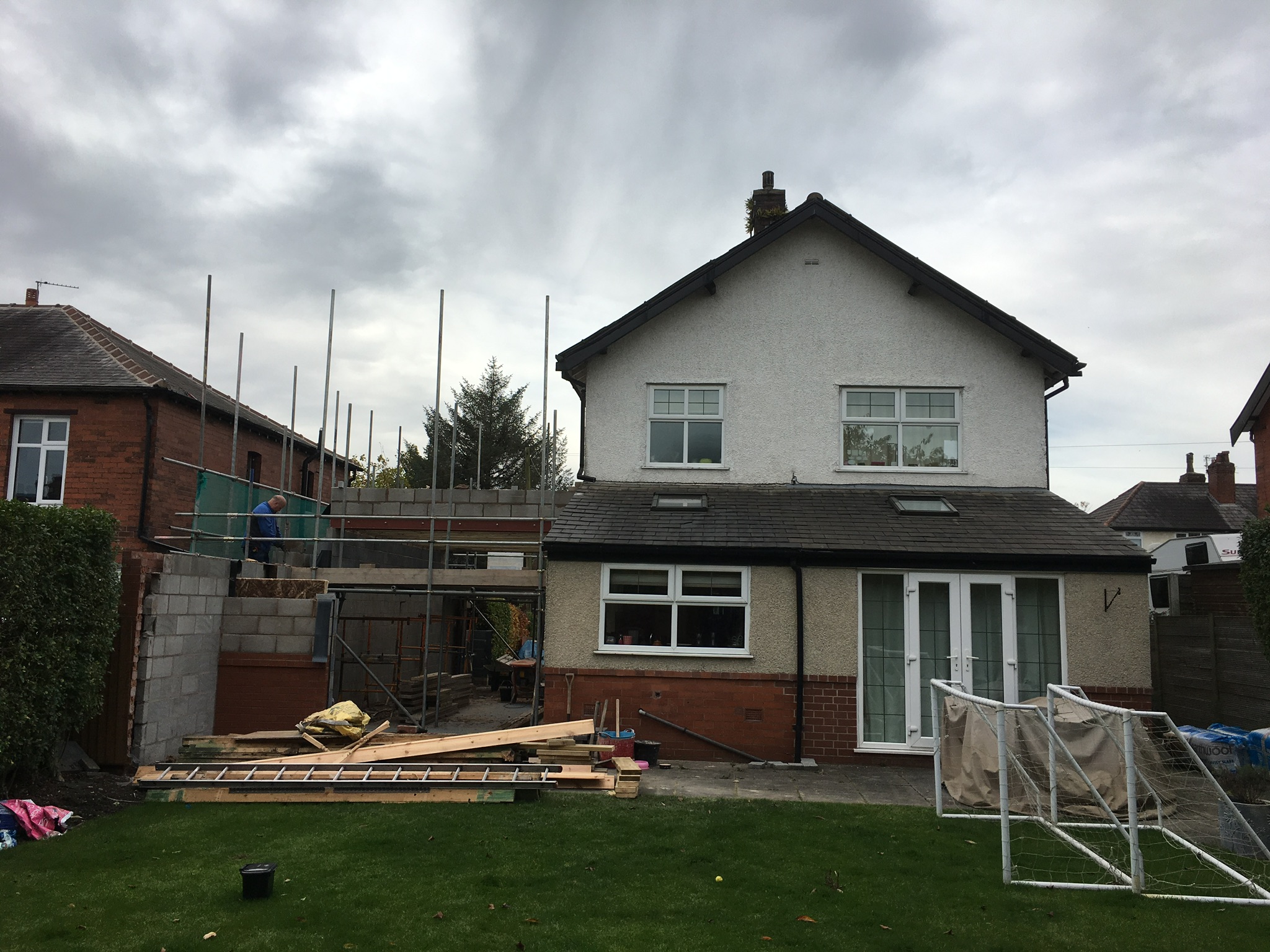Double storey side extension with single wrap around